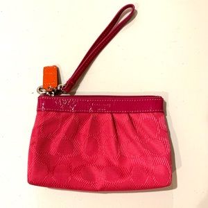 Pink coach wristlet